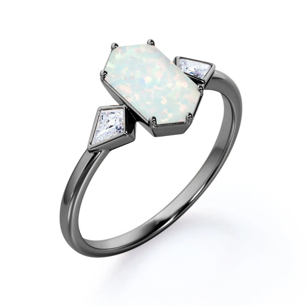 Elongated 1.10 carat Hexagonal Opal and marquise diamond bezel set engagement ring in Black gold