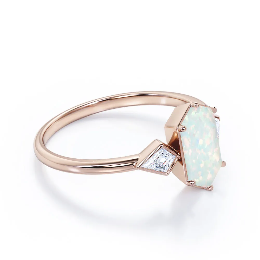 Elongated 1.10 carat Hexagonal Opal and marquise diamond bezel set engagement ring in Black gold