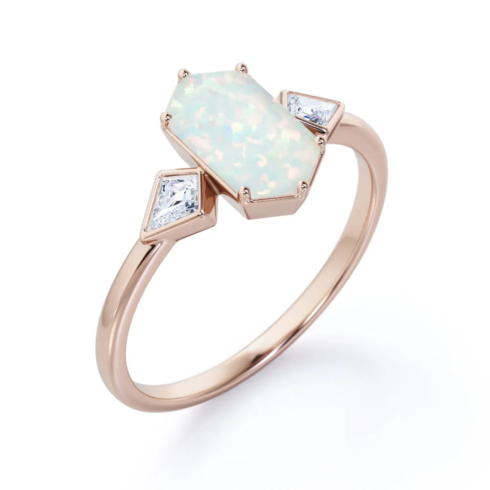 Elongated 1.10 carat Hexagonal Opal and marquise diamond bezel set engagement ring in Black gold