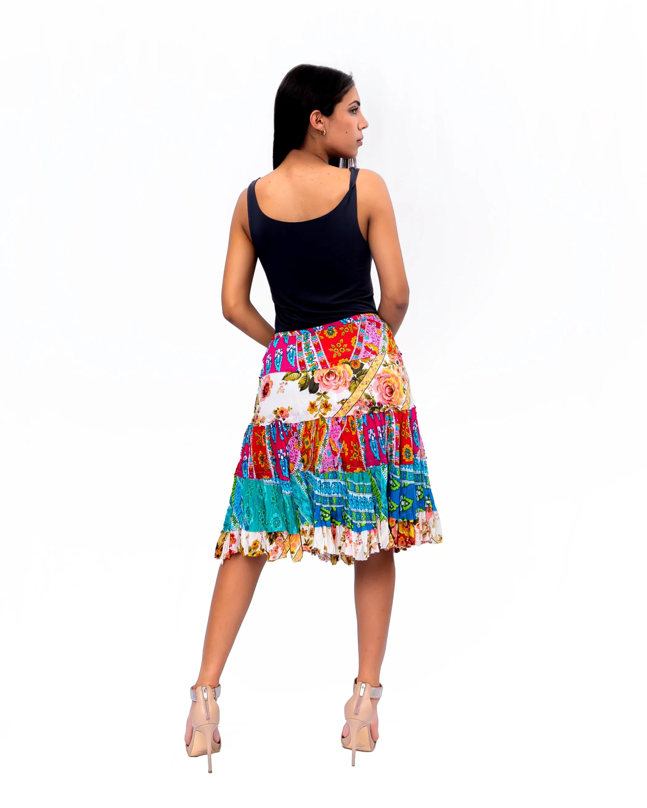 Five tiered Fabric mini ruffle skirt. In Multi.