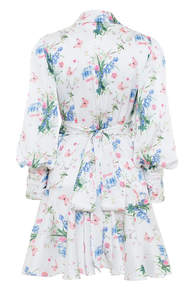 Mini dress with V-neck and ruffled skirt.