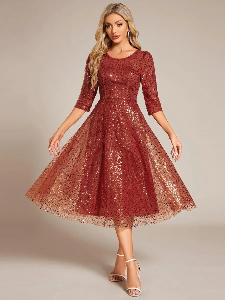 Robe d'invitée de mariage à manches 3/4 et col rond en sequins