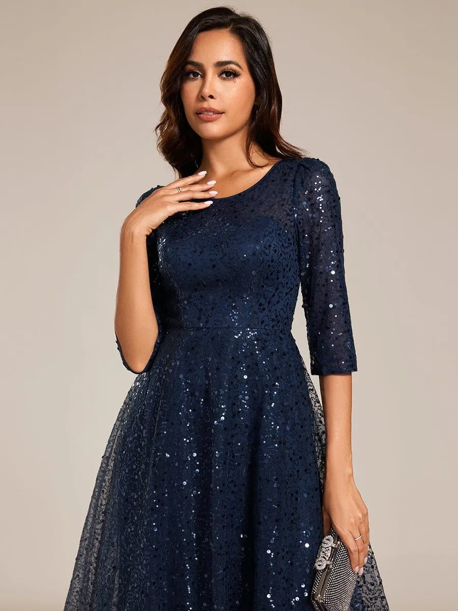 Robe d'invitée de mariage à manches 3/4 et col rond en sequins
