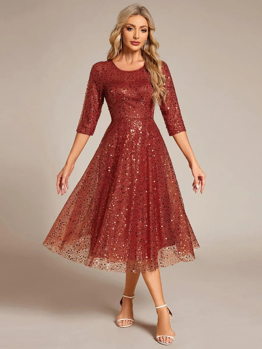 Robe d'invitée de mariage à manches 3/4 et col rond en sequins