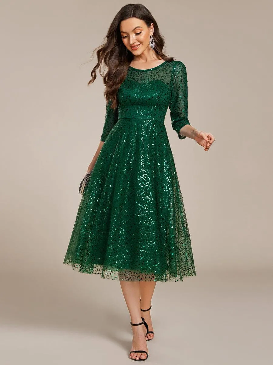 Robe d'invitée de mariage à manches 3/4 et col rond en sequins