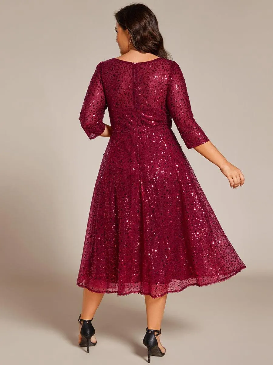 Robe d'invitée de mariage à manches 3/4 et col rond en sequins
