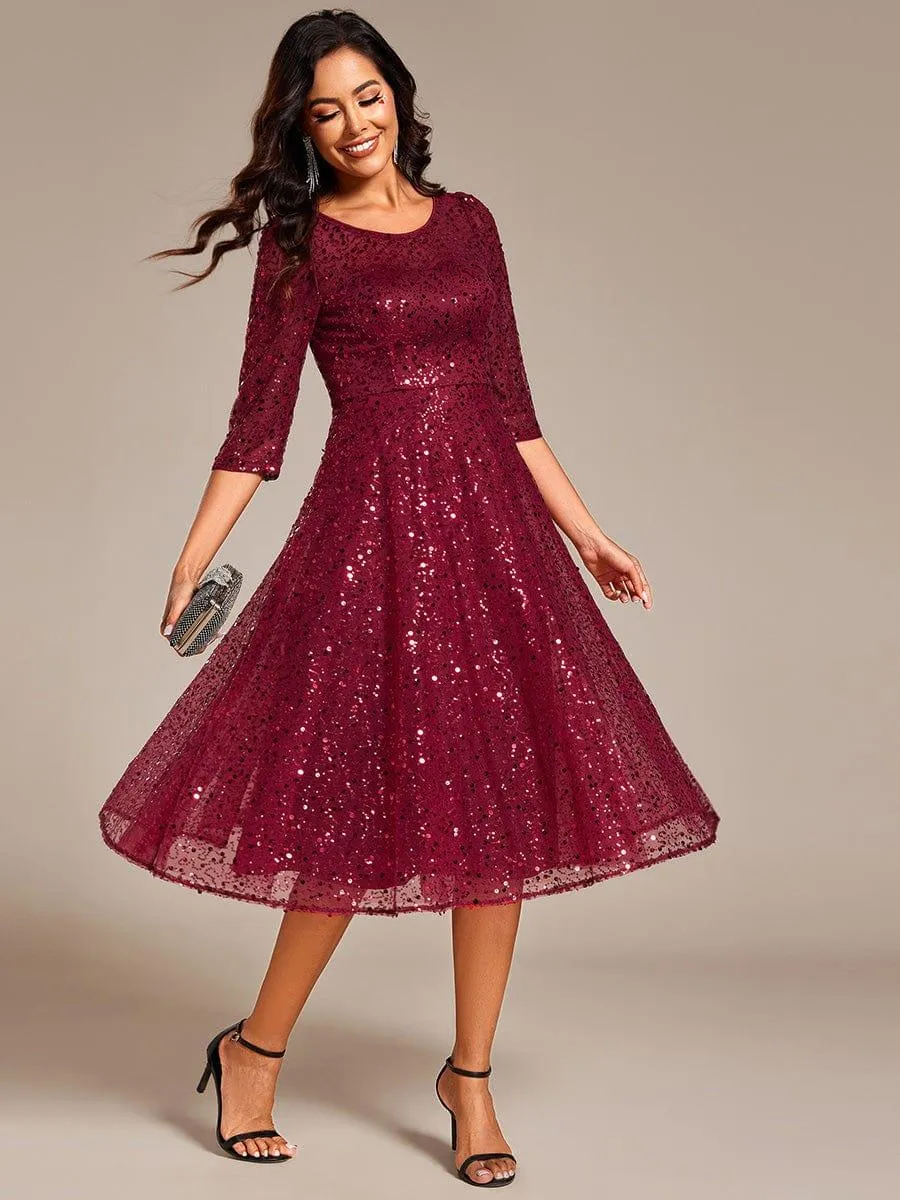 Robe d'invitée de mariage à manches 3/4 et col rond en sequins