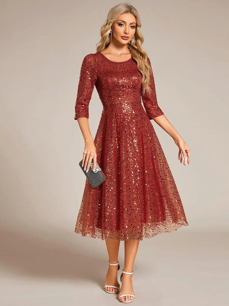 Robe d'invitée de mariage à manches 3/4 et col rond en sequins