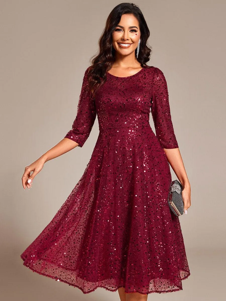 Robe d'invitée de mariage à manches 3/4 et col rond en sequins