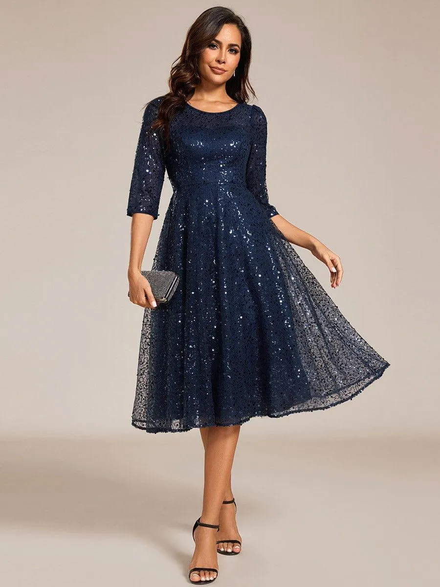 Robe d'invitée de mariage à manches 3/4 et col rond en sequins