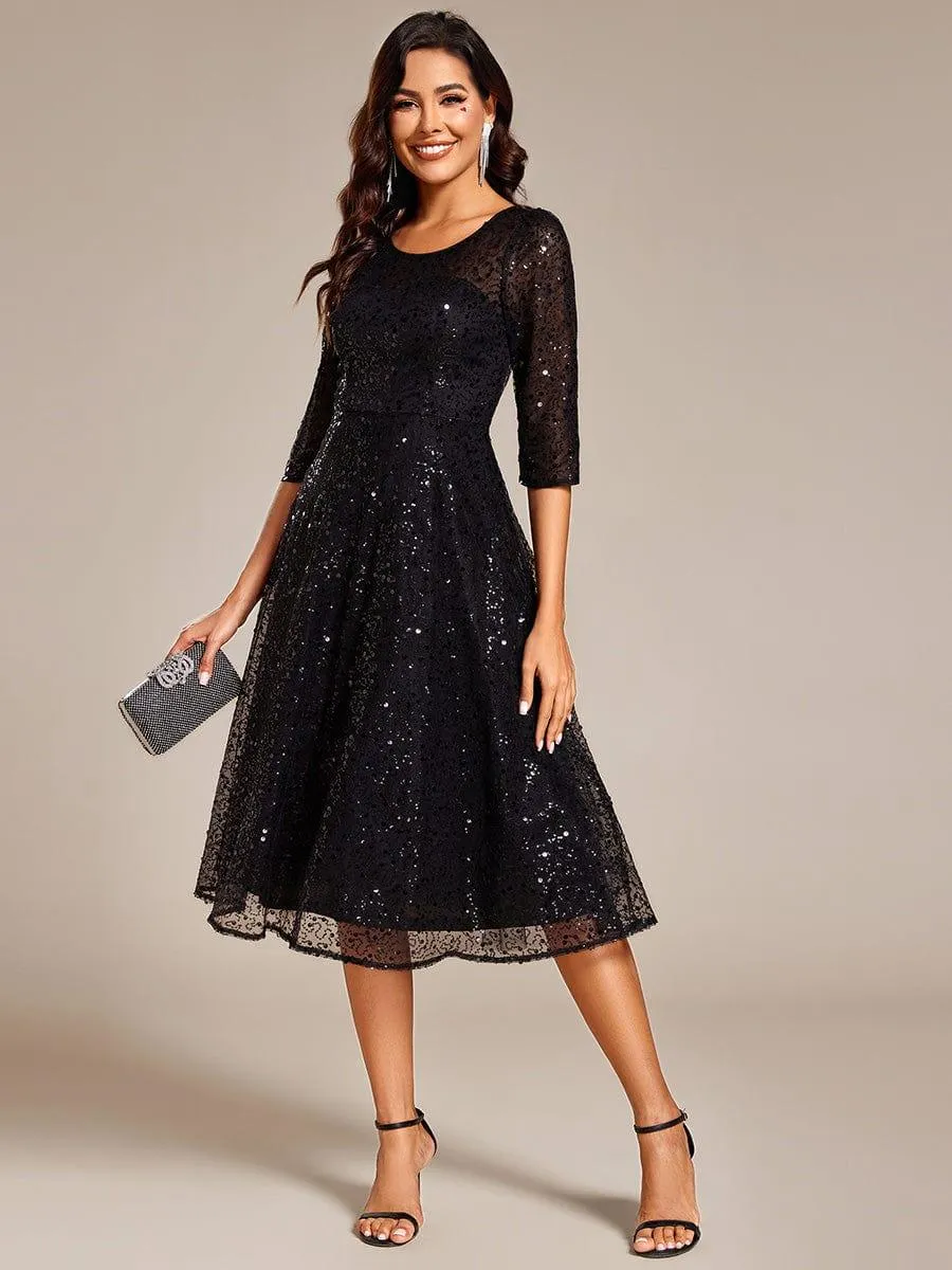 Robe d'invitée de mariage à manches 3/4 et col rond en sequins