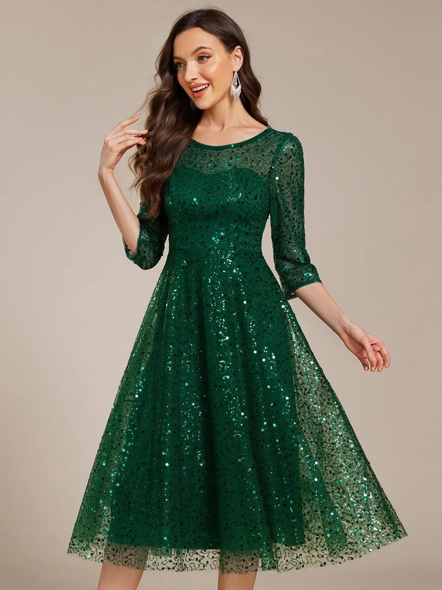 Robe d'invitée de mariage à manches 3/4 et col rond en sequins