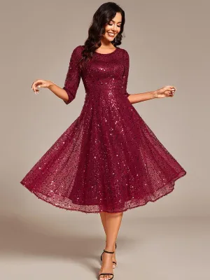 Robe d'invitée de mariage à manches 3/4 et col rond en sequins