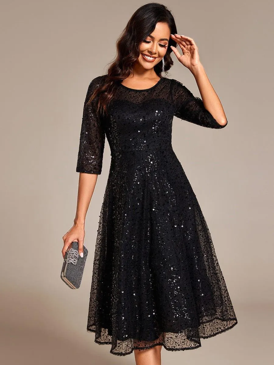 Robe d'invitée de mariage à manches 3/4 et col rond en sequins