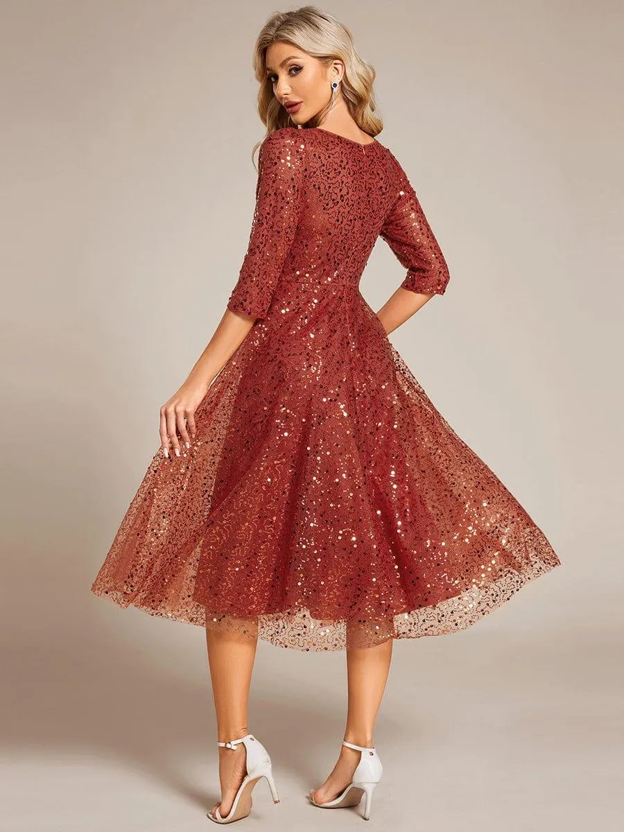Robe d'invitée de mariage à manches 3/4 et col rond en sequins