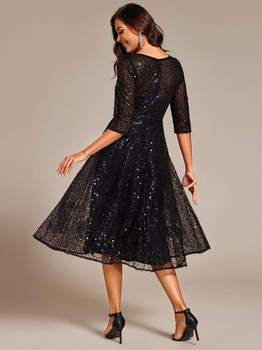 Robe d'invitée de mariage à manches 3/4 et col rond en sequins