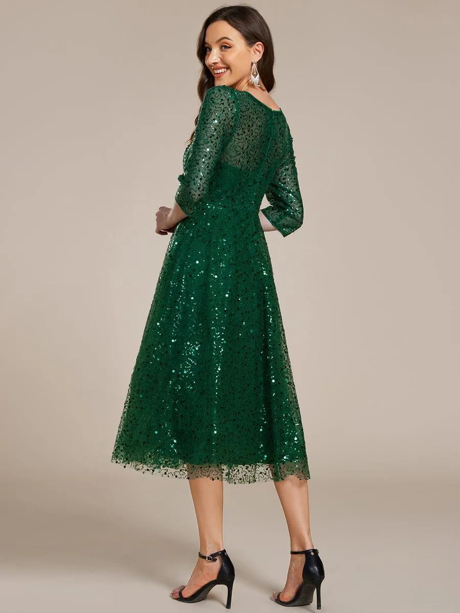 Robe d'invitée de mariage à manches 3/4 et col rond en sequins