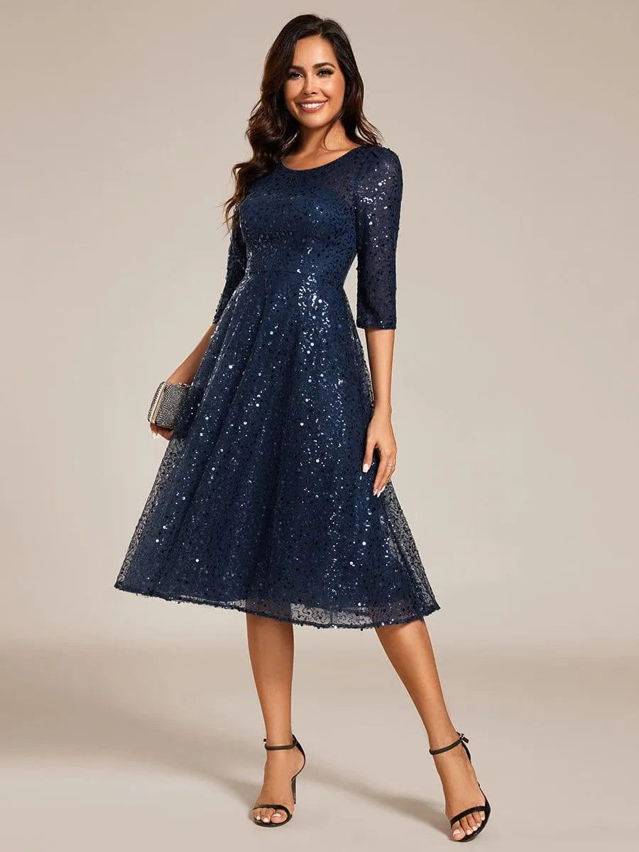 Robe d'invitée de mariage à manches 3/4 et col rond en sequins
