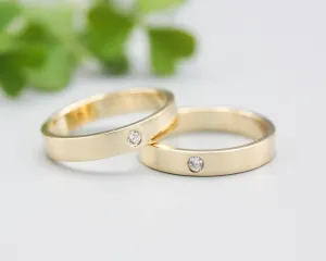 Set of his and her wedding bands ring in 18k gold in high polished band