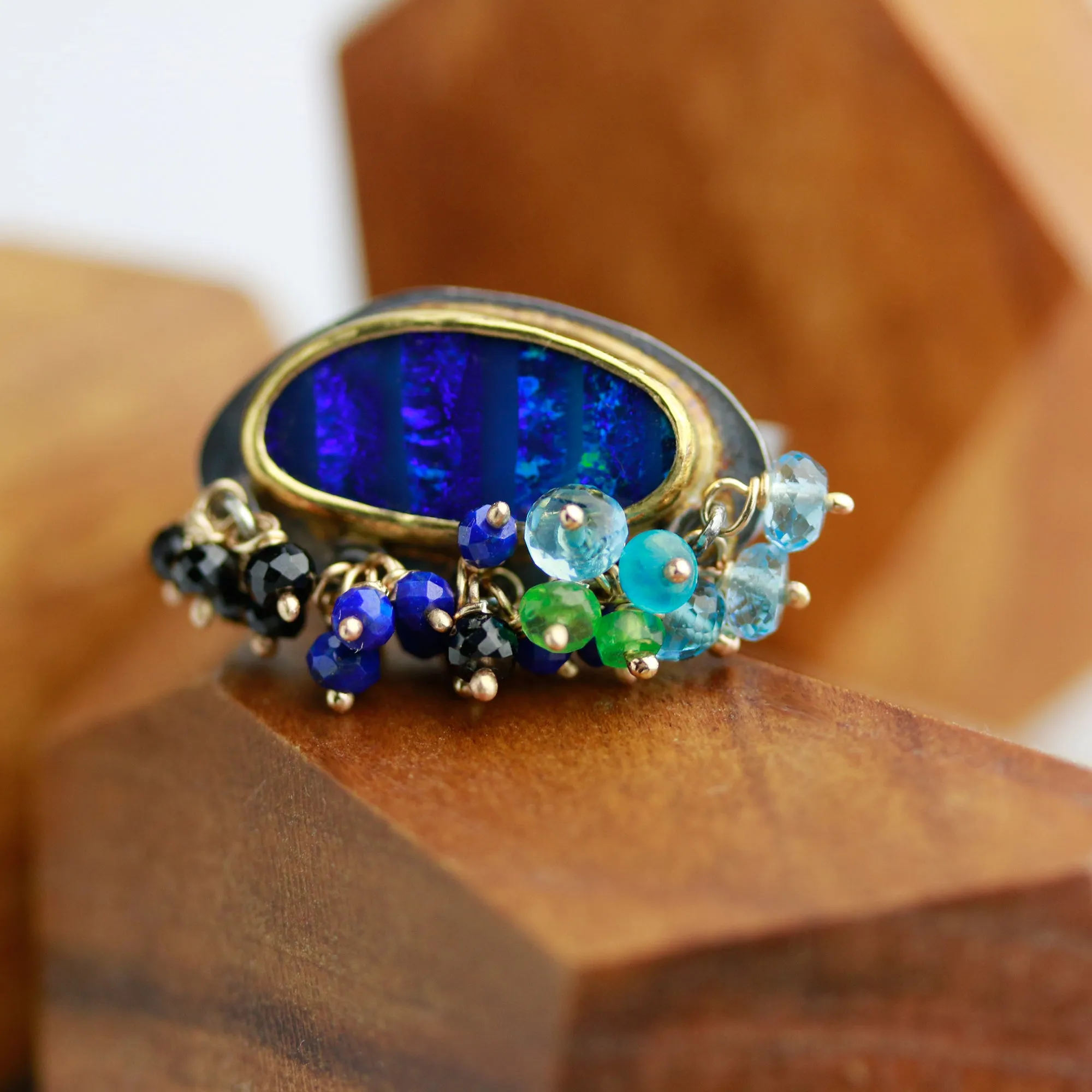 Sold. Navy Blue Striped Opal Ring with Fringe. Size 8.