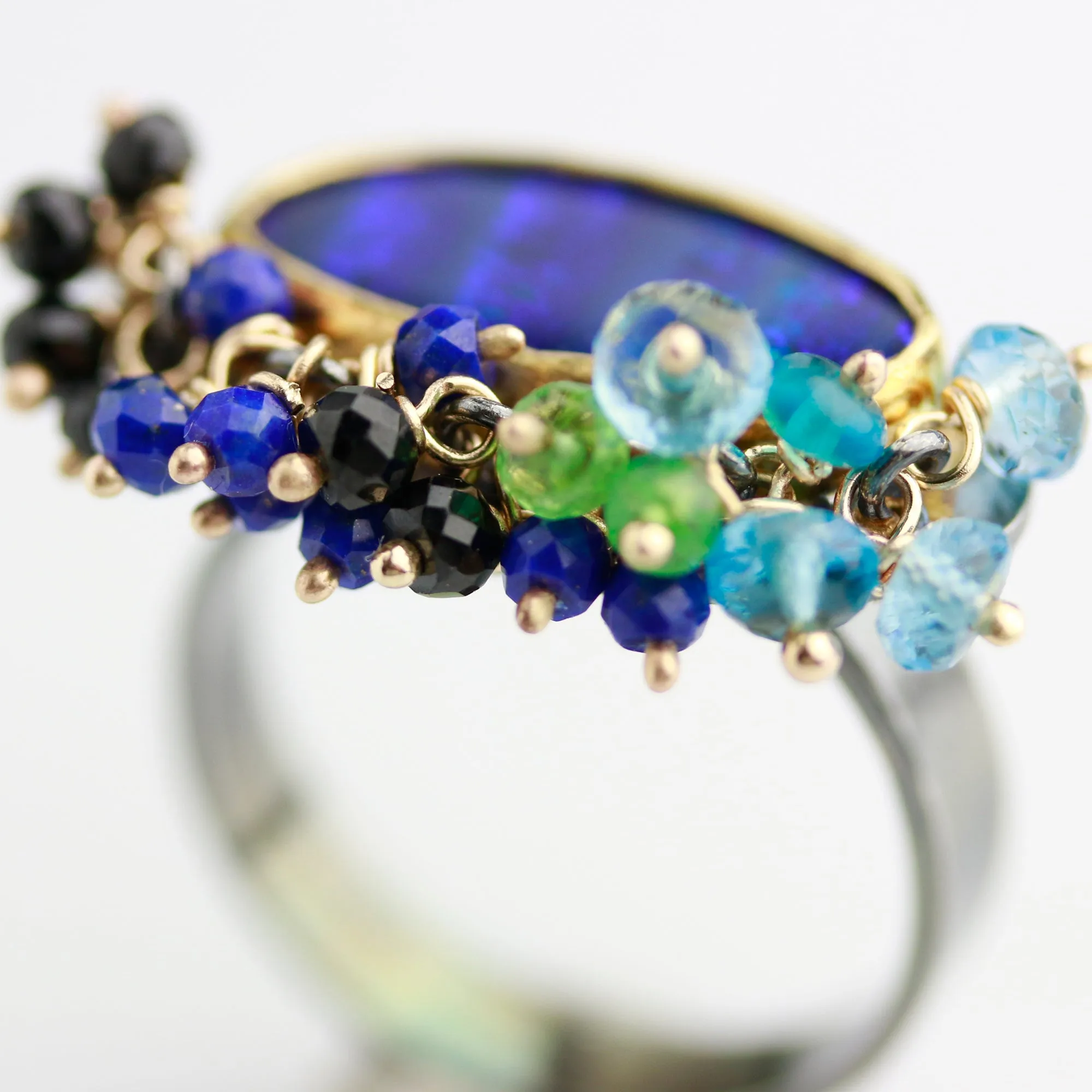 Sold. Navy Blue Striped Opal Ring with Fringe. Size 8.