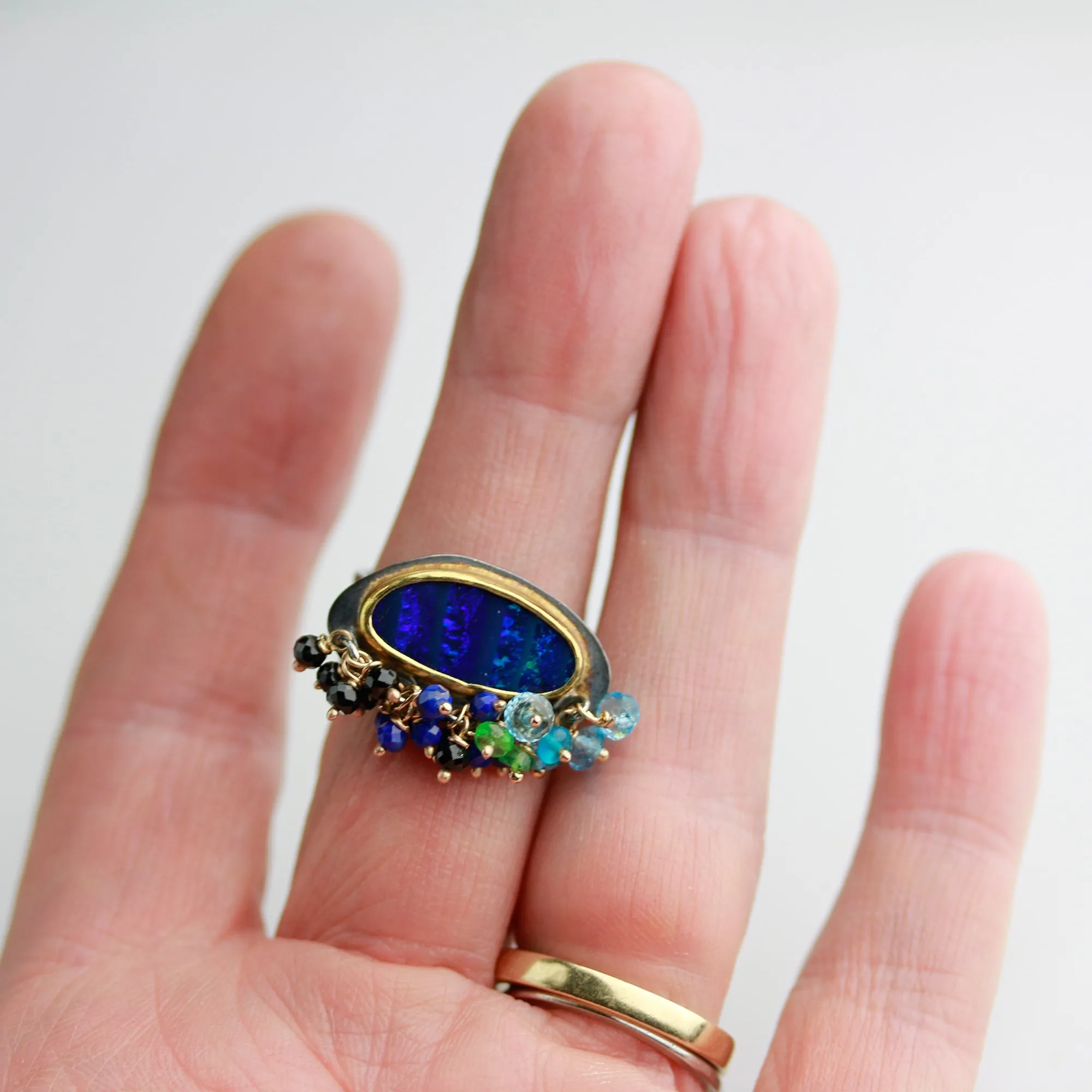 Sold. Navy Blue Striped Opal Ring with Fringe. Size 8.