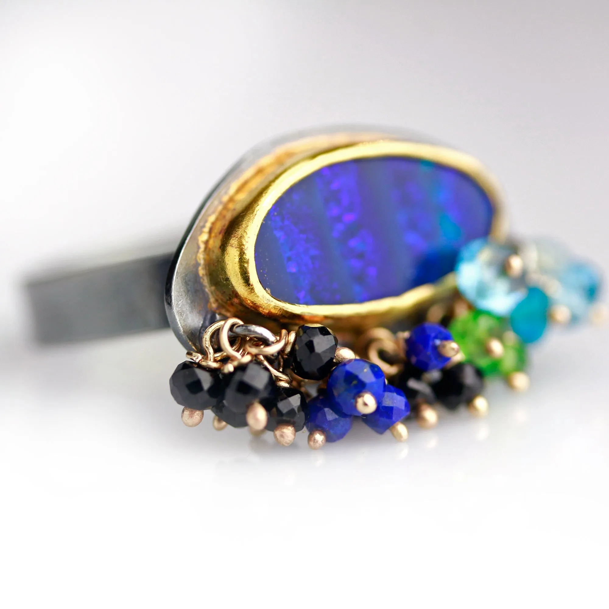 Sold. Navy Blue Striped Opal Ring with Fringe. Size 8.