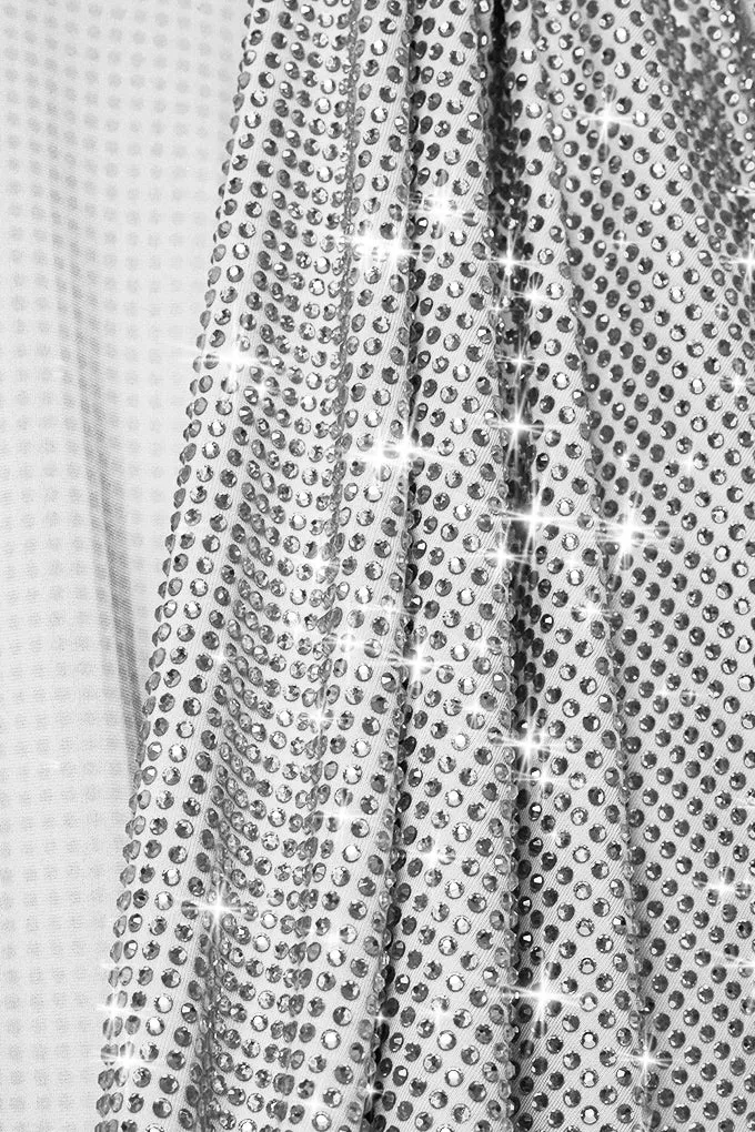 Sparkling mini dress with open back