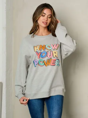 WOMEN'S LONG SLEEVE GRAPHIC PULLOVER SWEATER